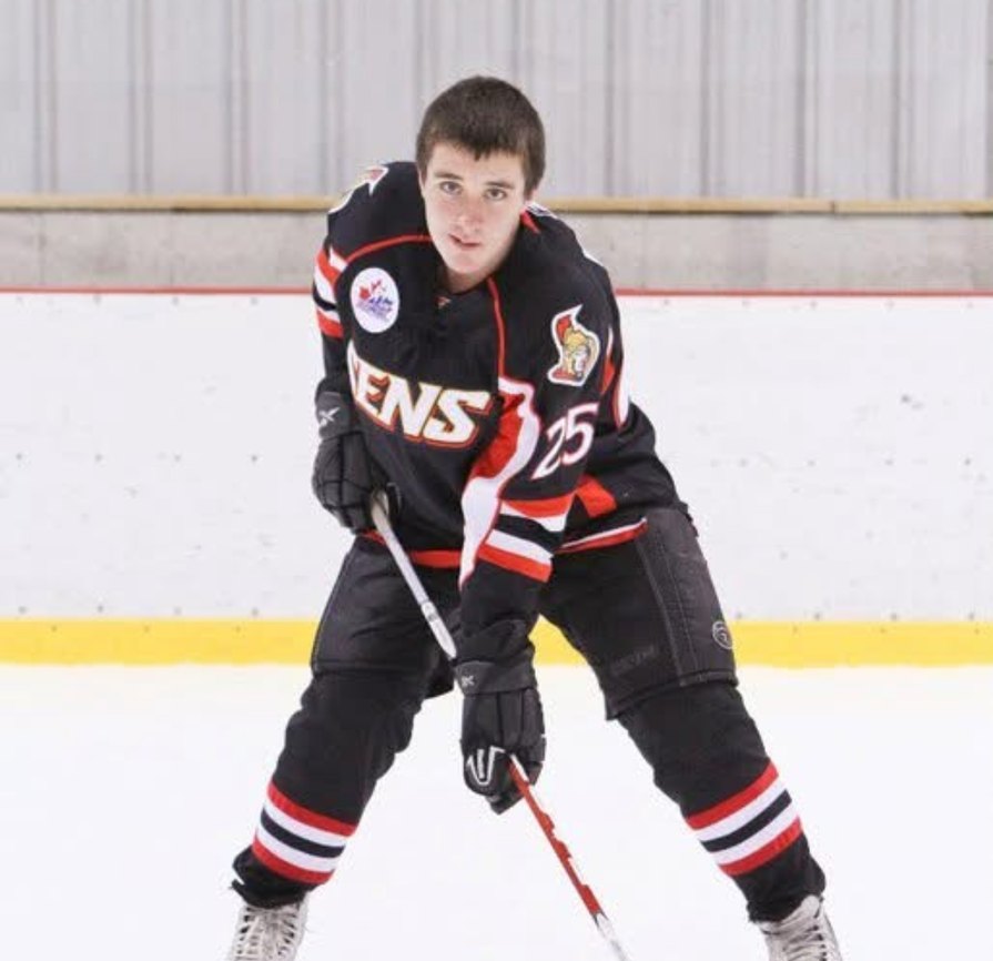 Devan Kealey carrying the puck up the ice